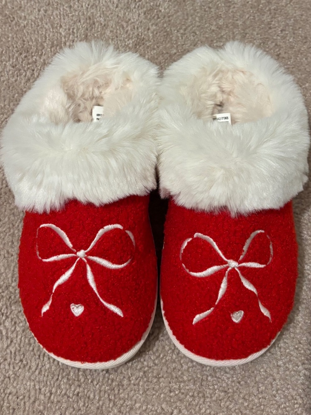 Red and white fluffy slippers